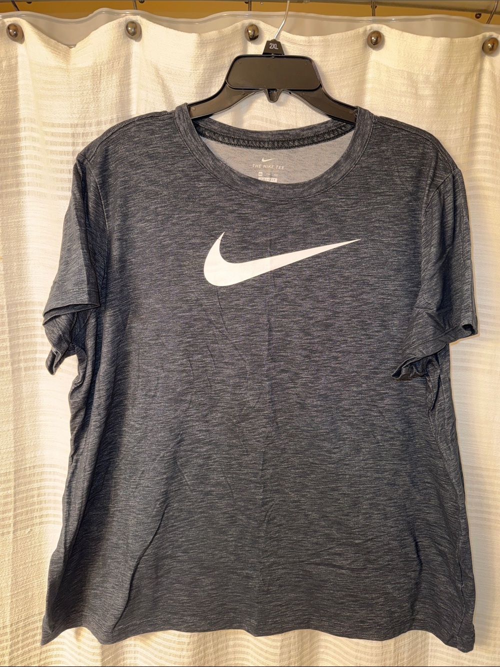 Nike women’s Heather Dark Blue Short Sleeve Tee with White Swoosh